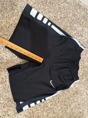 Nike Black Shorts with White Swoosh and Side Panels